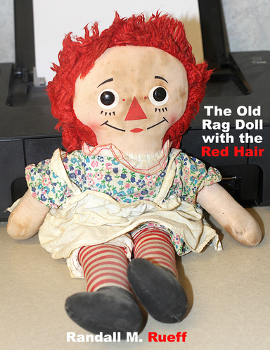 The Old Rag Doll with the Red Hair
