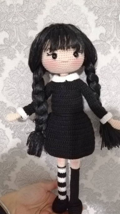Wallpaper for wednesday addams and crochet doll