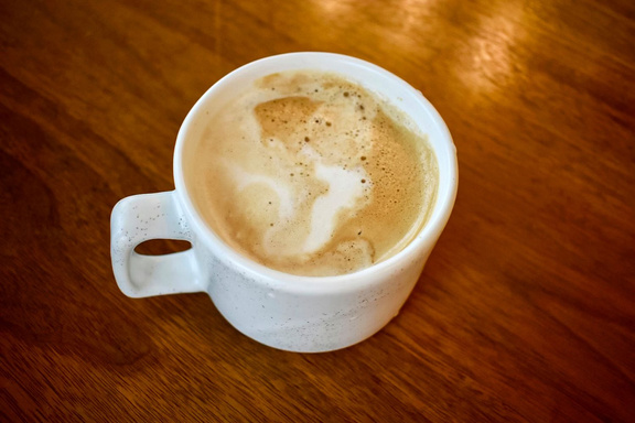 A Coffee mug and a cigarette