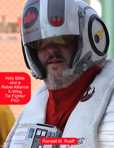 Holy Bible and a Rebel Alliance X-Wing Tie Fighter Pilot