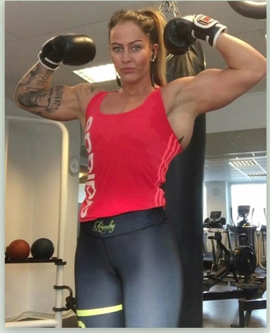 A huge, muscular Sadistic Amazon keeps males as her play-toys